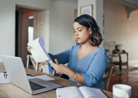 A woman is reading document