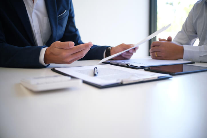 Client having a meeting with real estate attorney