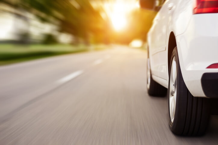 Car driving down the road