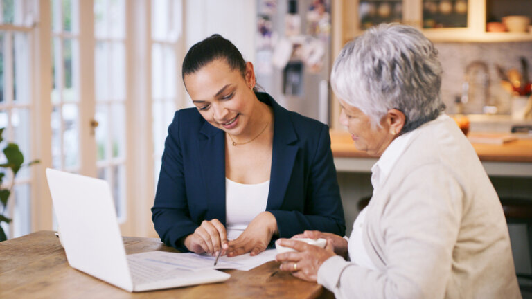 Older woman estate planning with attorney